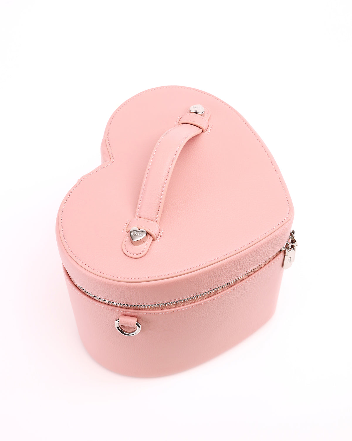 Top view of the heart-shaped lid and handle on GALS Lovette Vanity Case Large in Blush Pink