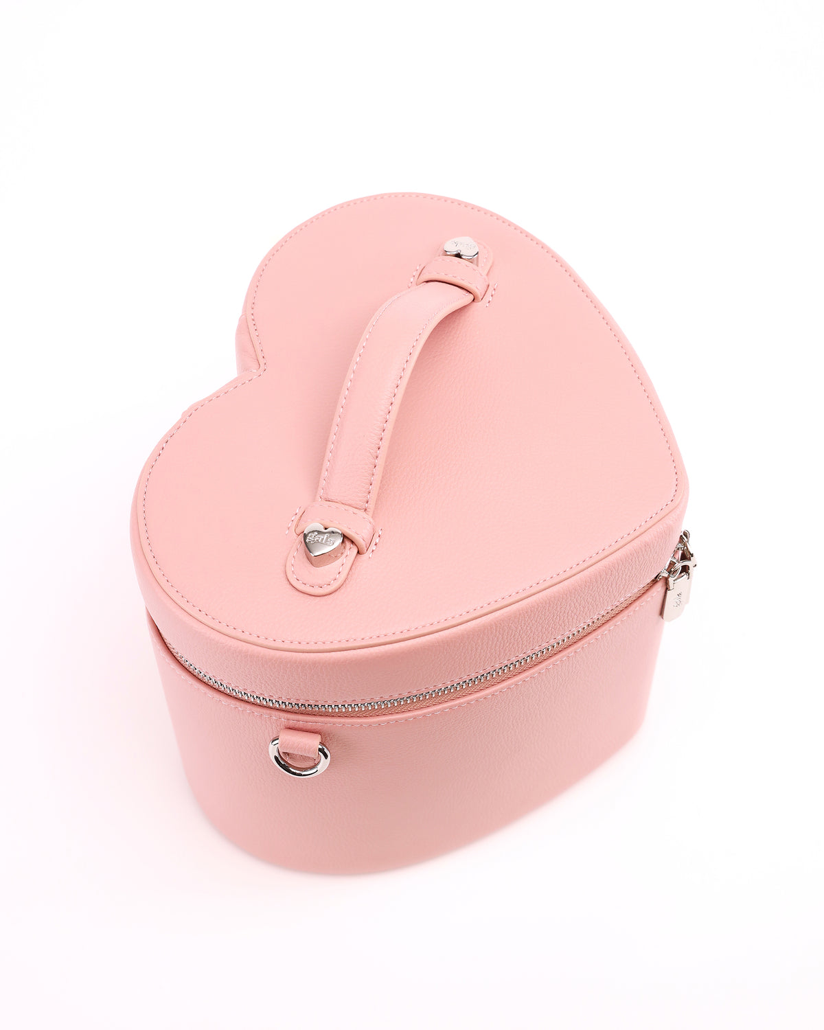 Top view of the heart-shaped lid and handle on GALS Mini Lovette Vanity Case in Blush Pink
