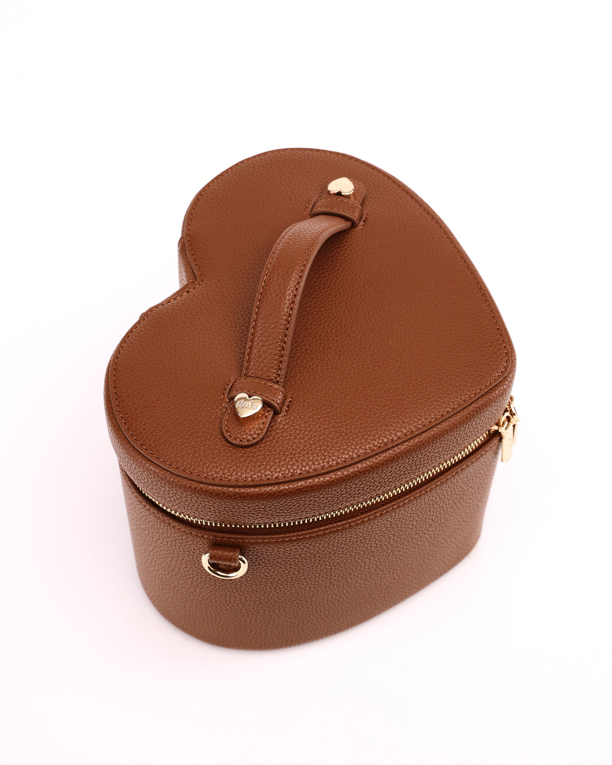 Top view of the heart-shaped lid and handle on GALS Lovette Vanity Case Large in Mocha