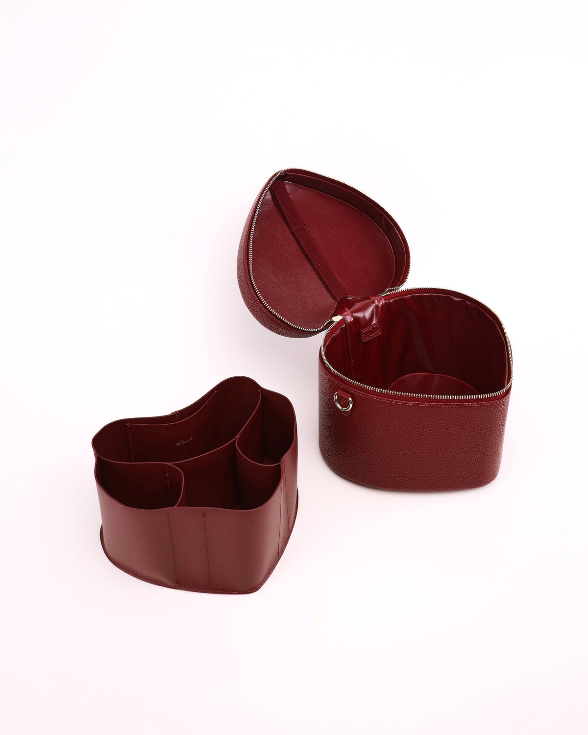 Open GALS Mini Lovette Vanity Case in Mulberry with its removable organiser placed beside the case