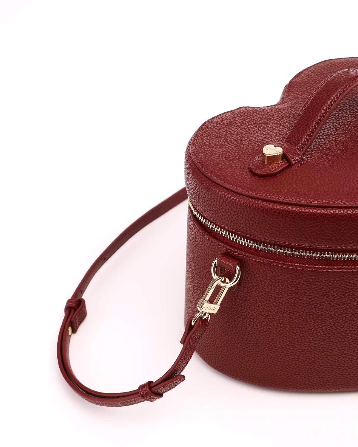 Close-up of the strap attachment and hardware on GALS Mini Lovette Vanity Case in Mulberry