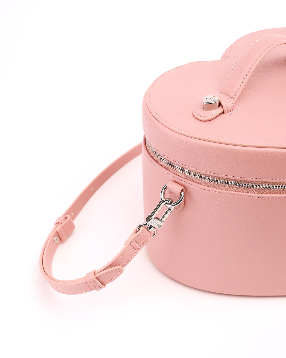 Close-up of the strap attachment and hardware on GALS Lovette Vanity Case Large in Blush Pink