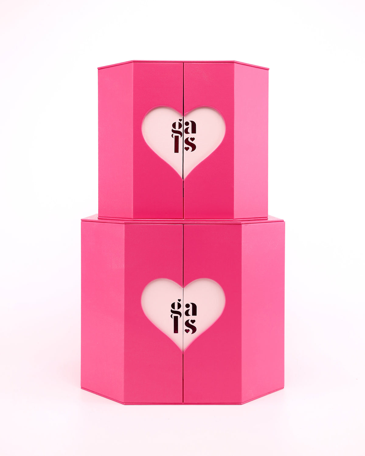 Two stacked pink GALS Lovette vanity presentation boxes in different sizes with heart-shaped logo panels