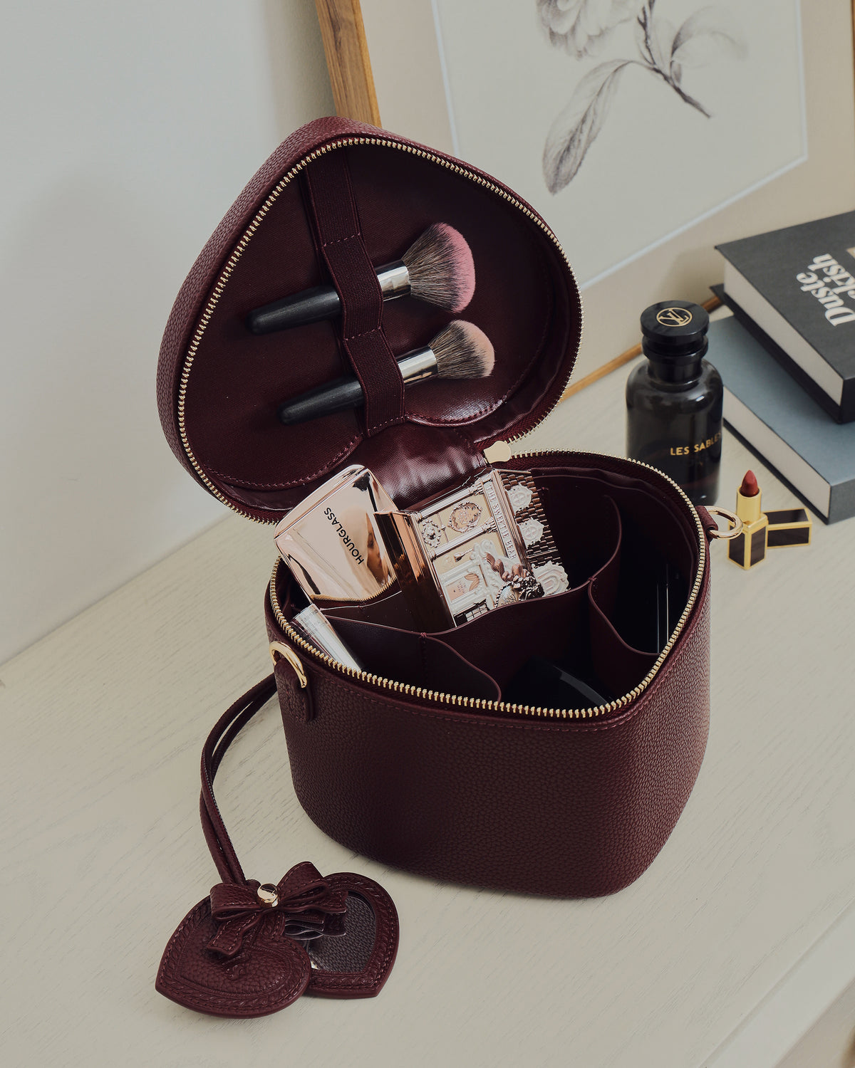 Open GALS Mini Lovette Vanity Case in Mulberry showing makeup and beauty storage