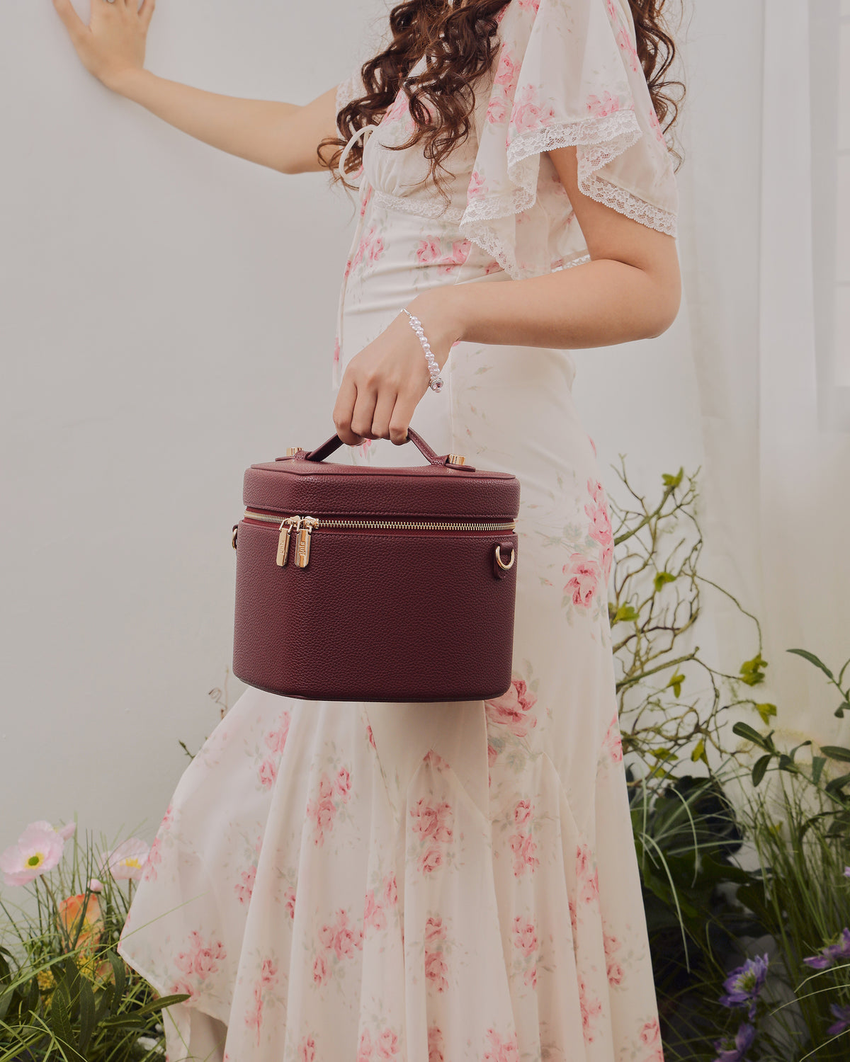 Model styling GALS Lovette Vanity Case Large in Mulberry