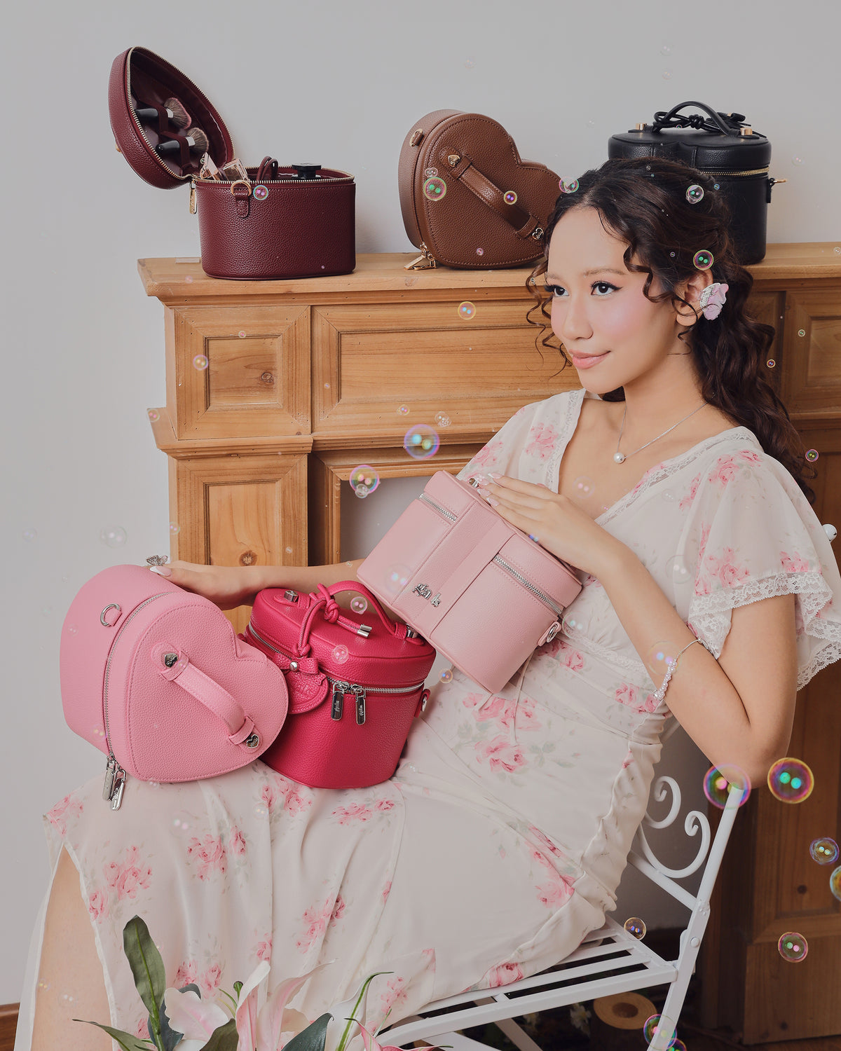 Model styling GALS Mini Lovette Vanity Case in Mulberry