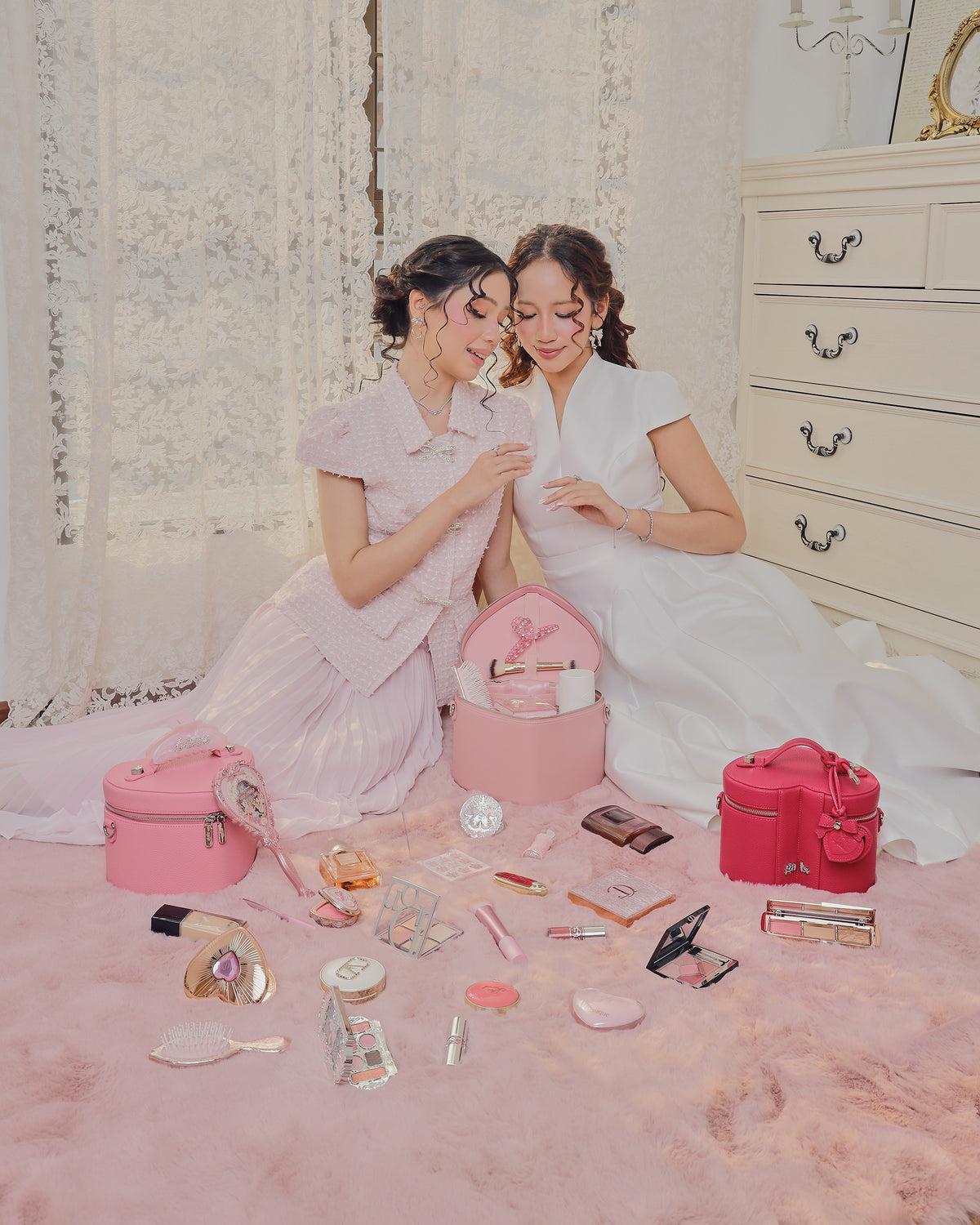 GALS Lovette vanity campaign with pink and Berry Pink vanity cases and beauty accessories