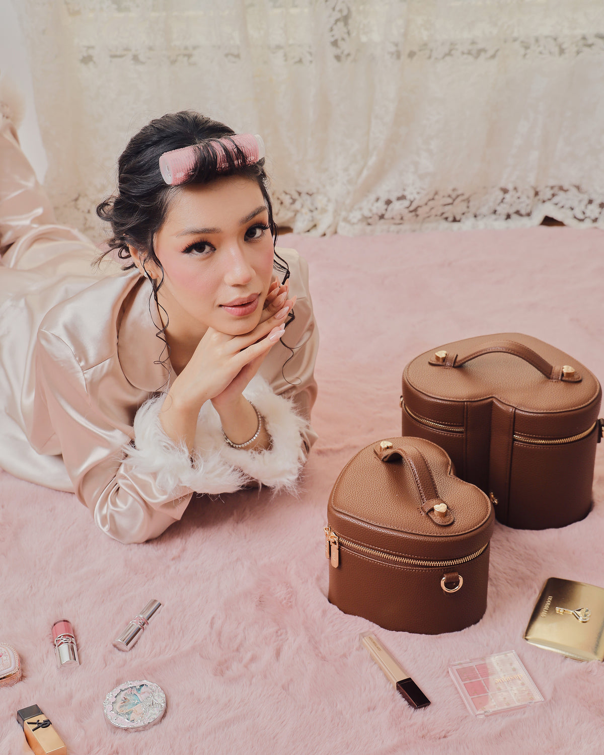 Model styling GALS Mini Lovette Vanity Case in Mocha