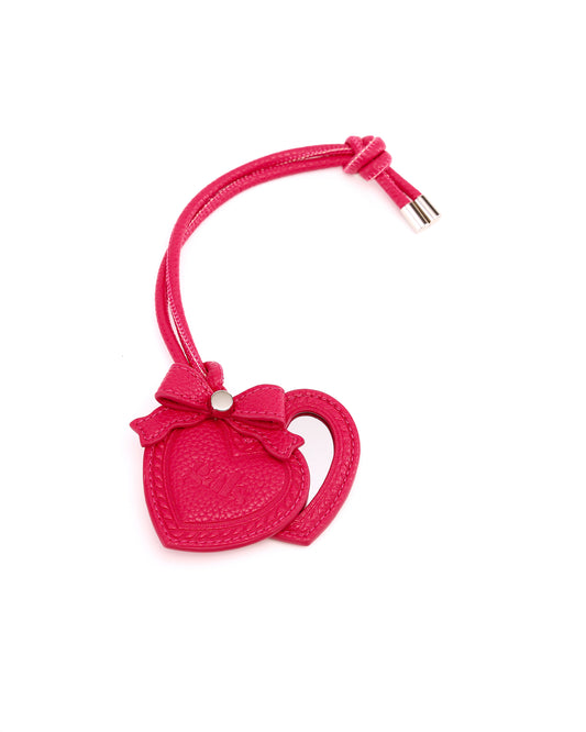 GALS Mini Lovette Mirror Tag in Berry Pink opened to show the heart-shaped mirror