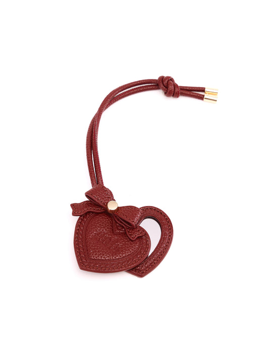 GALS Lovette Mirror Tag Large in Mulberry opened to show the heart-shaped mirror