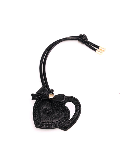 GALS Mini Lovette Mirror Tag in Onyx opened to show the heart-shaped mirror